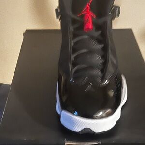 Jordan Men's Black and White Sneakers with Red Accents. Six Rings